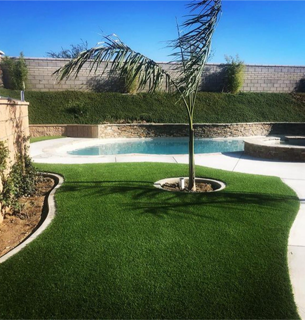 Residential Artificial Grass & Pavers for Landscapes, Walkways, Patios